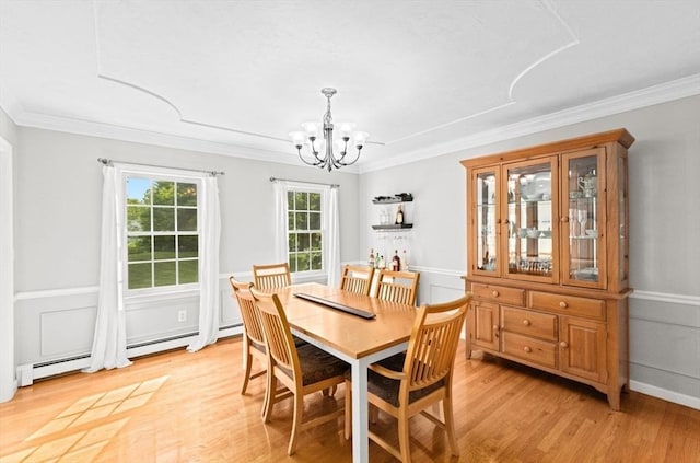 7 Paddock Way, Marshfield, MA 02050 - dining room with a chandelier, ornamental molding, light wood-type flooring, and wainscoting