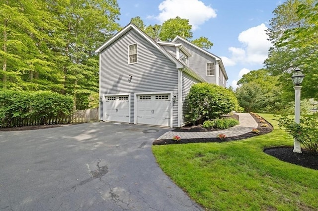 7 Paddock Way, Marshfield, MA 02050 - view of side of home featuring driveway and an attached garage
