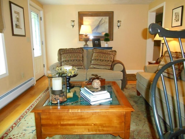 951 Dana Rd, Barre, MA 01005 - living area featuring a baseboard radiator, baseboards, and wood finished floors