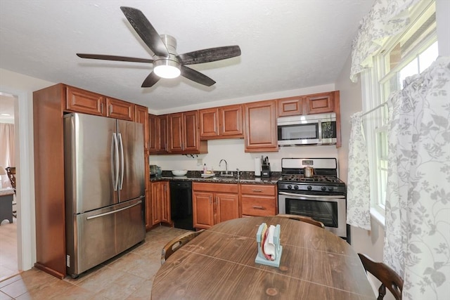 3 Myles Standish Dr Unit 8, Haverhill, MA 01835 - kitchen with appliances with stainless steel finishes, a sink, light tile patterned flooring, and a ceiling fan
