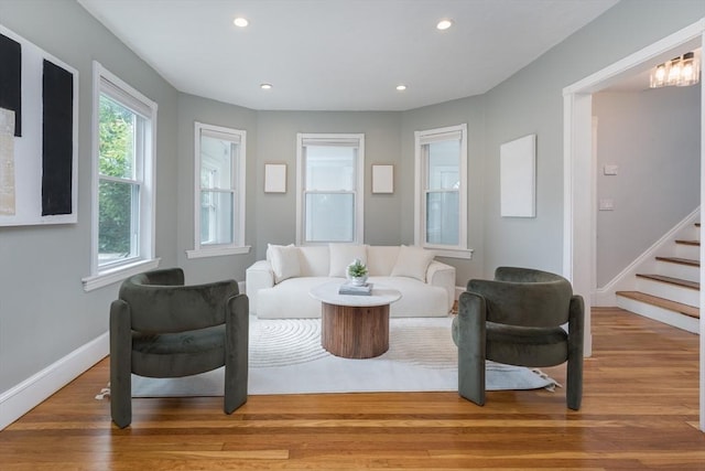 27 Round Hill St, Boston, MA 02130 - living room featuring wood finished floors, recessed lighting, and stairs