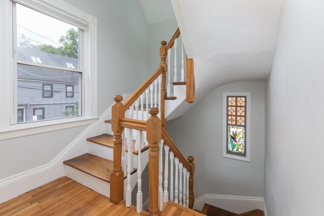 27 Round Hill St, Boston, MA 02130 - stairway with wood finished floors and lofted ceiling