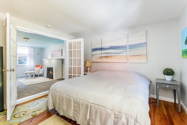 bedroom featuring wood-type flooring