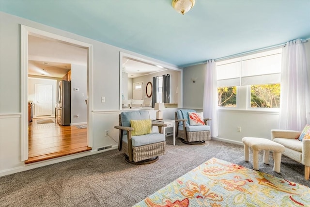 living area featuring hardwood / wood-style flooring