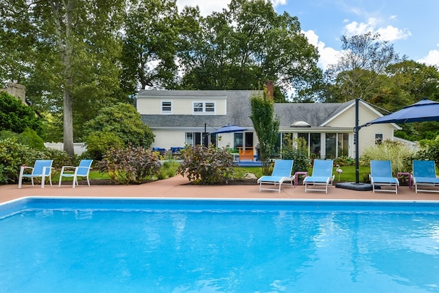 view of swimming pool featuring a patio