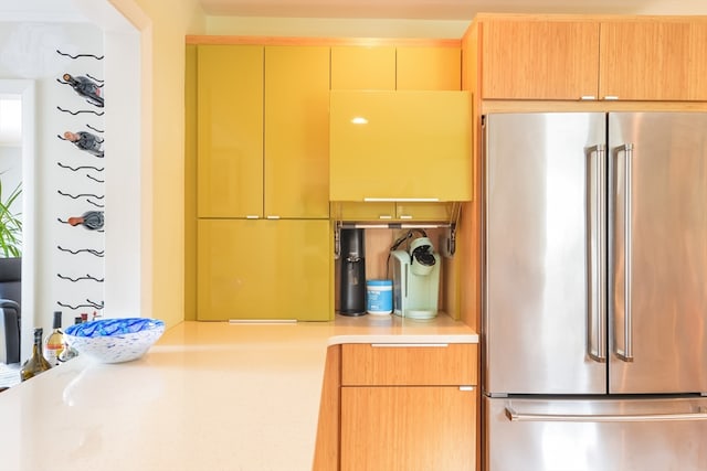 kitchen with high end refrigerator