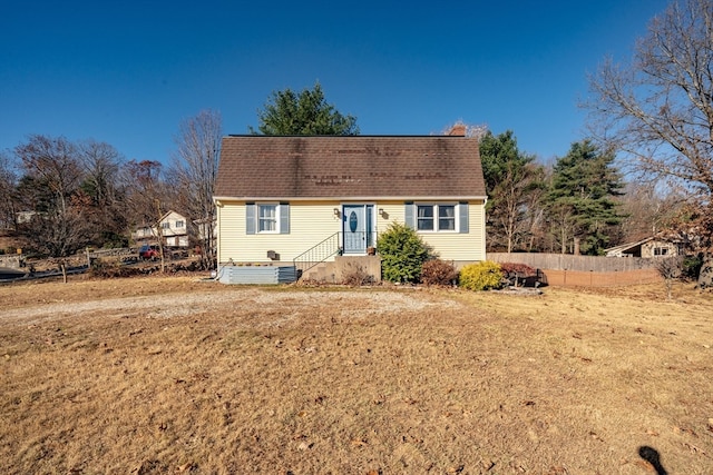 view of front of home featuring a front lawn