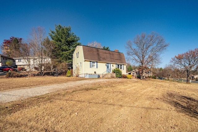 exterior space with a front yard