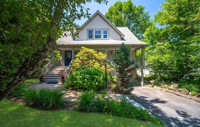 79 Henderson St, Needham, MA 02492 - bungalow-style home with covered porch, stairway, and driveway