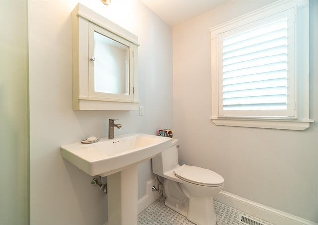 79 Henderson St, Needham, MA 02492 - bathroom with toilet and baseboards