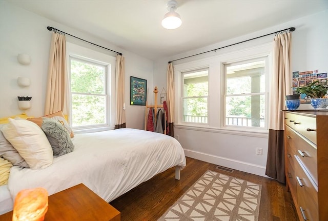 79 Henderson St, Needham, MA 02492 - bedroom with multiple windows and wood finished floors