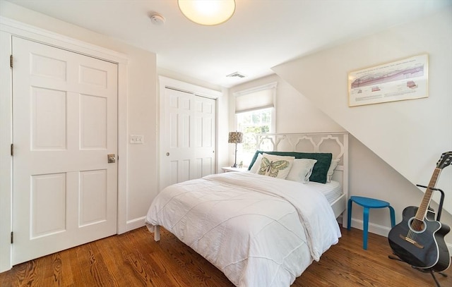 79 Henderson St, Needham, MA 02492 - bedroom with wood finished floors and a closet