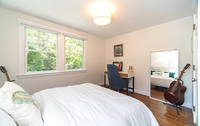 79 Henderson St, Needham, MA 02492 - bedroom with wood finished floors and baseboards