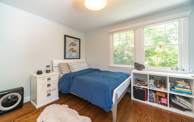 79 Henderson St, Needham, MA 02492 - bedroom with wood finished floors and multiple windows