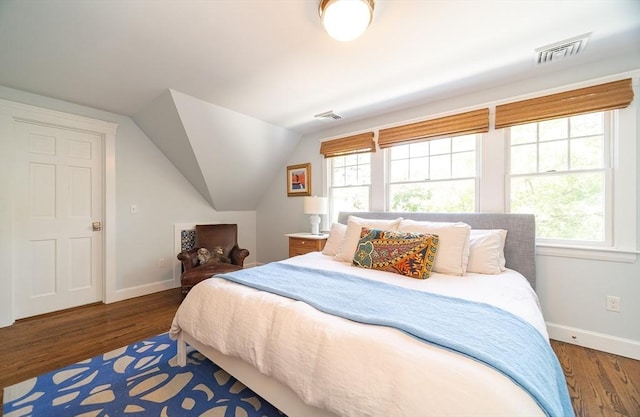 79 Henderson St, Needham, MA 02492 - bedroom with wood finished floors, multiple windows, and vaulted ceiling