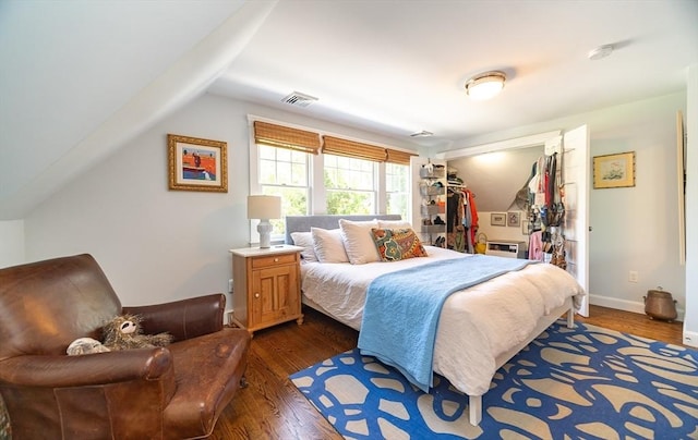 79 Henderson St, Needham, MA 02492 - bedroom featuring dark wood finished floors, a closet, and vaulted ceiling
