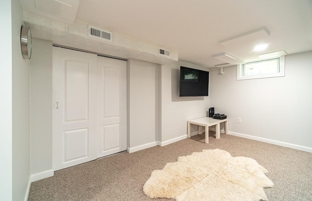79 Henderson St, Needham, MA 02492 - below grade area with carpet flooring and baseboards
