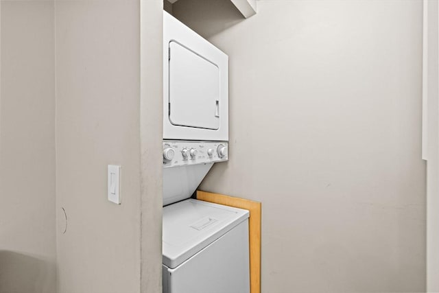 250 Hammond Pond Pkwy Unit 409S, Newton, MA 02467 - laundry room with stacked washer / dryer
