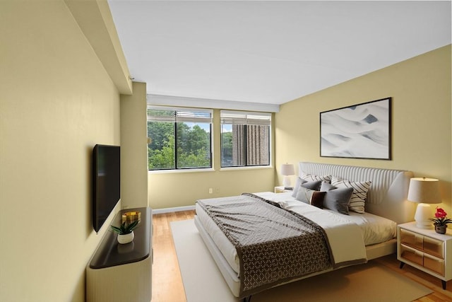 250 Hammond Pond Pkwy Unit 409S, Newton, MA 02467 - bedroom featuring wood finished floors and baseboards