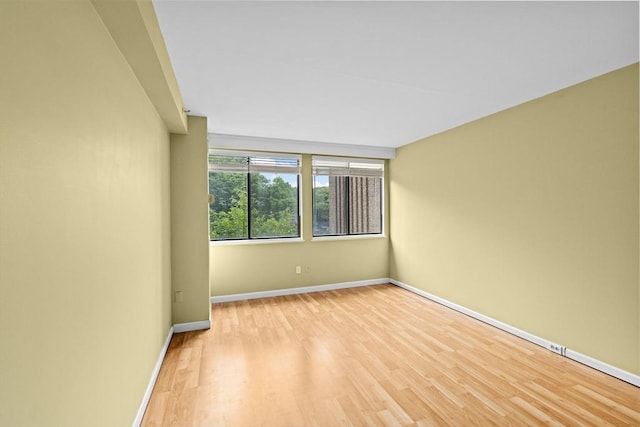 250 Hammond Pond Pkwy Unit 409S, Newton, MA 02467 - empty room with wood finished floors and baseboards