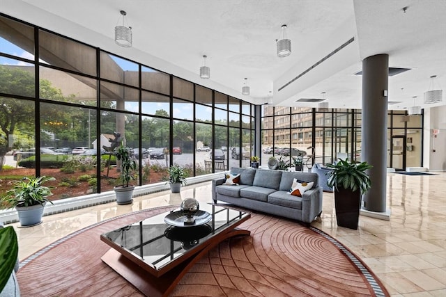 250 Hammond Pond Pkwy Unit 409S, Newton, MA 02467 - building lobby with floor to ceiling windows and a towering ceiling