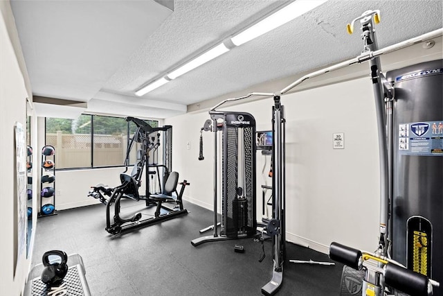 250 Hammond Pond Pkwy Unit 409S, Newton, MA 02467 - workout area featuring water heater and a textured ceiling