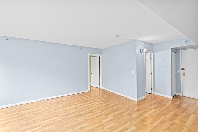 250 Hammond Pond Pkwy Unit 409S, Newton, MA 02467 - spare room featuring light wood-type flooring and a smoke detector
