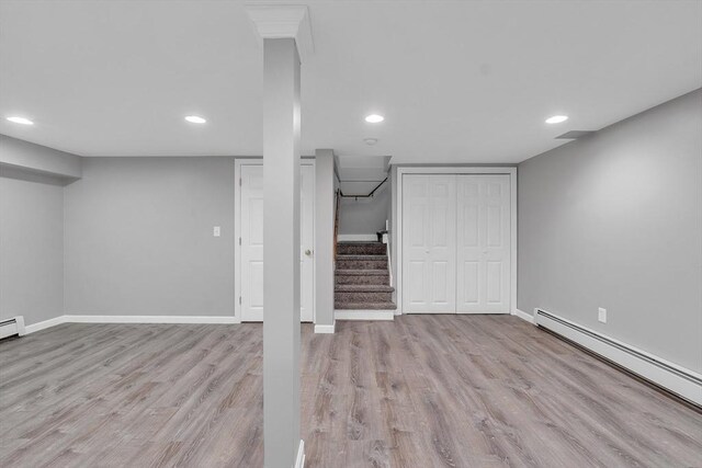 10 Briarcliff Ln, Paxton, MA 01612 - finished basement with baseboard heating, wood finished floors, recessed lighting, and baseboards