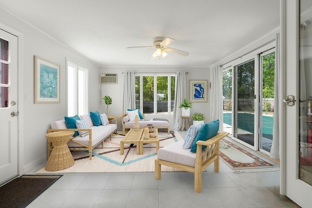 sunroom featuring ornamental molding, french doors, and an AC wall unit