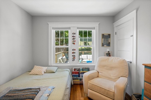 bedroom featuring wood finished floors