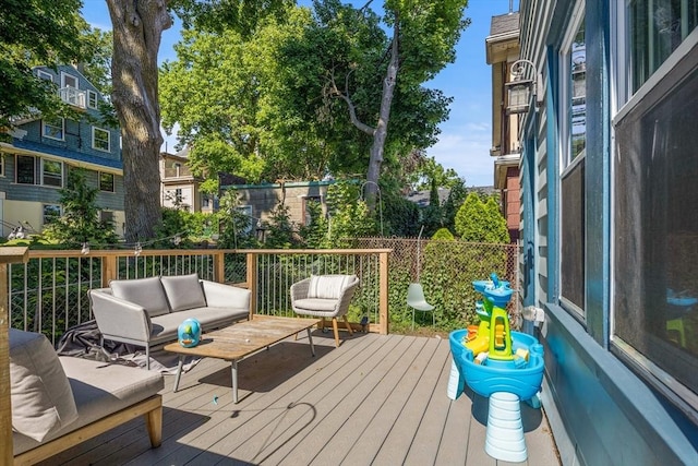 deck with an outdoor living space