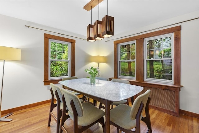 50 Grove Hill Park, Newton, MA 02460 - dining room with baseboards and light wood-style flooring