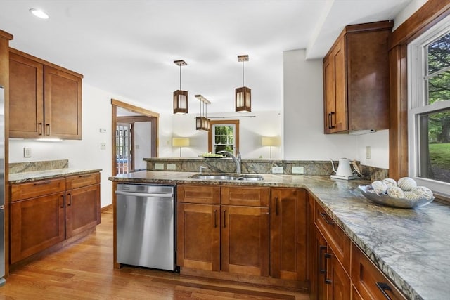 50 Grove Hill Park, Newton, MA 02460 - kitchen featuring a sink, plenty of natural light, a peninsula, light wood-type flooring, and stainless steel dishwasher