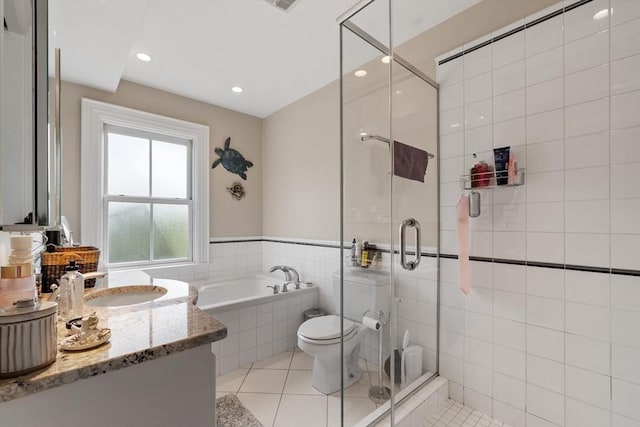 38 Concord Sq Unit 2, Boston, MA 02118 - full bath with vanity, a bath, a shower stall, tile patterned floors, and recessed lighting