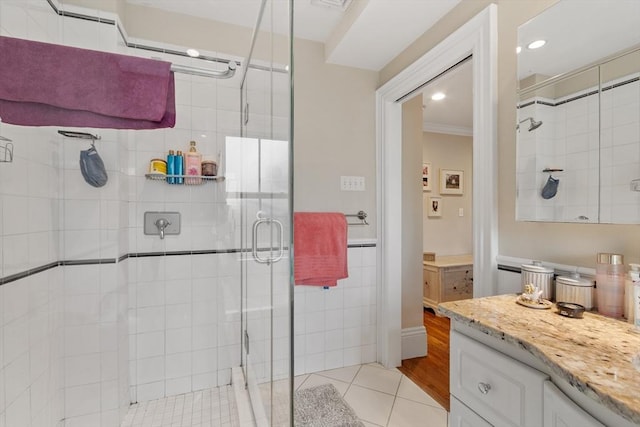 38 Concord Sq Unit 2, Boston, MA 02118 - full bath with a stall shower, tile patterned floors, ornamental molding, and recessed lighting