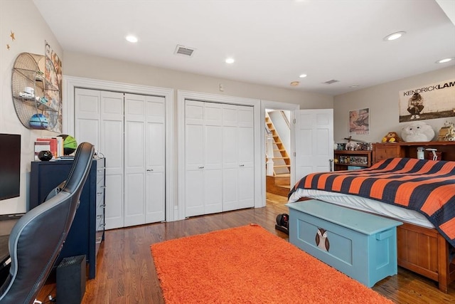 38 Concord Sq Unit 2, Boston, MA 02118 - bedroom with two closets, dark wood finished floors, recessed lighting, and an office area