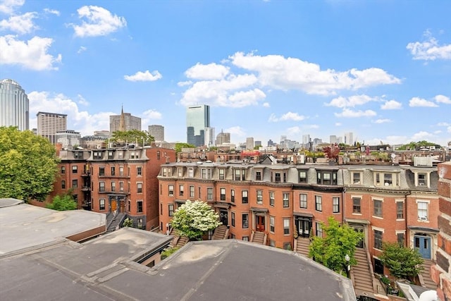 38 Concord Sq Unit 2, Boston, MA 02118 - view of building exterior featuring a view of skyline