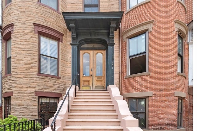 38 Concord Sq Unit 2, Boston, MA 02118 - doorway to property with french doors and stone siding
