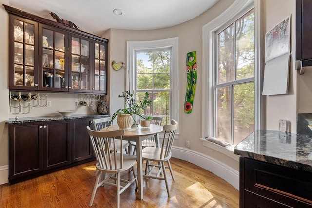 38 Concord Sq Unit 2, Boston, MA 02118 - dining area with light wood-style flooring and baseboards