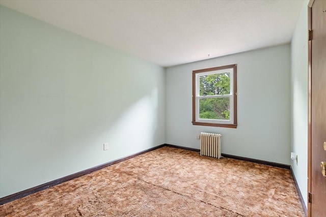 61 Mattawa Cir, Orange, MA 01364 - carpeted spare room with radiator heating unit and baseboards