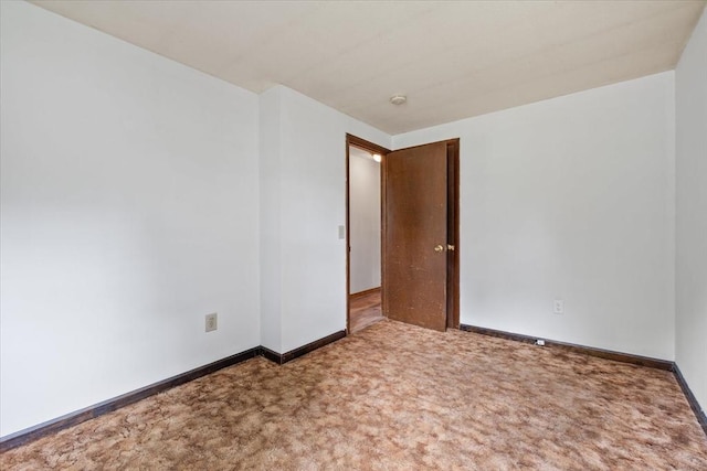 61 Mattawa Cir, Orange, MA 01364 - carpeted empty room featuring baseboards