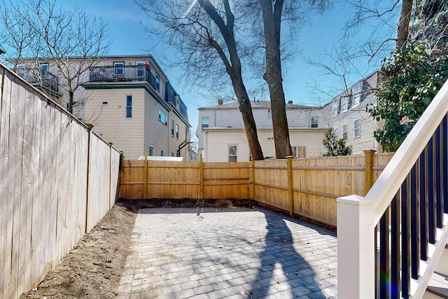 exterior space with a fenced backyard