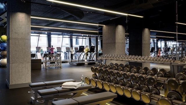 workout area with floor to ceiling windows