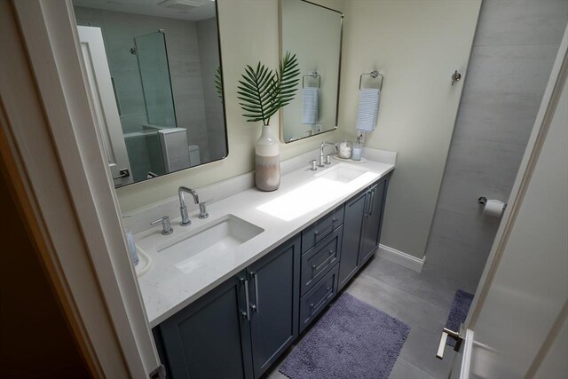 796 Foundry St, Easton, MA 02375 - bathroom with double vanity and baseboards