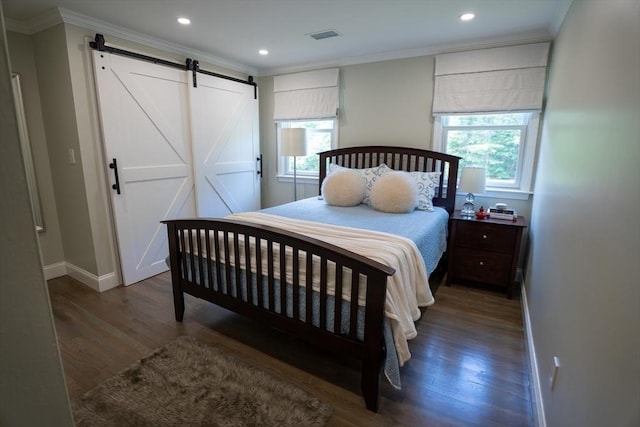 796 Foundry St, Easton, MA 02375 - bedroom featuring a barn door, crown molding, wood finished floors, and recessed lighting