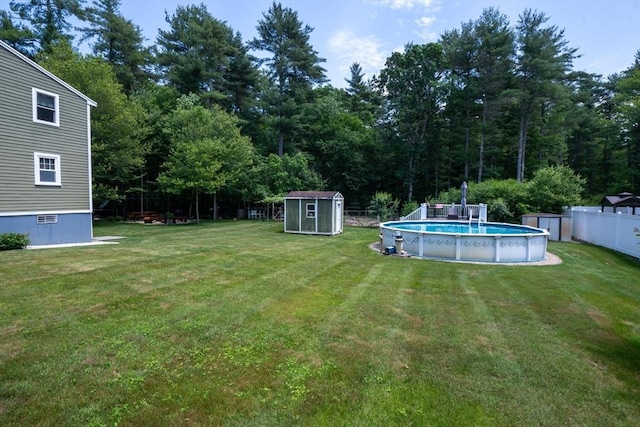 796 Foundry St, Easton, MA 02375 - fenced backyard with a shed and an outdoor pool