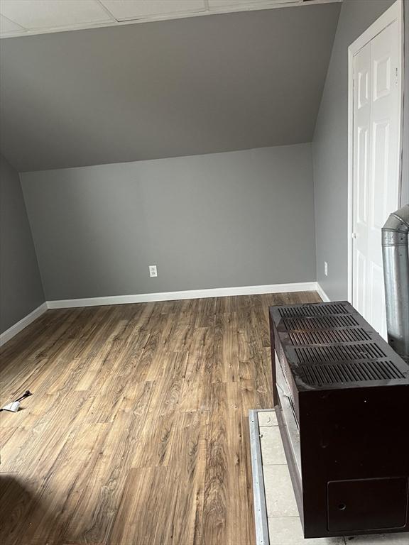 422 County St, Fall River, MA 02723 - bonus room featuring wood finished floors, lofted ceiling, and baseboards