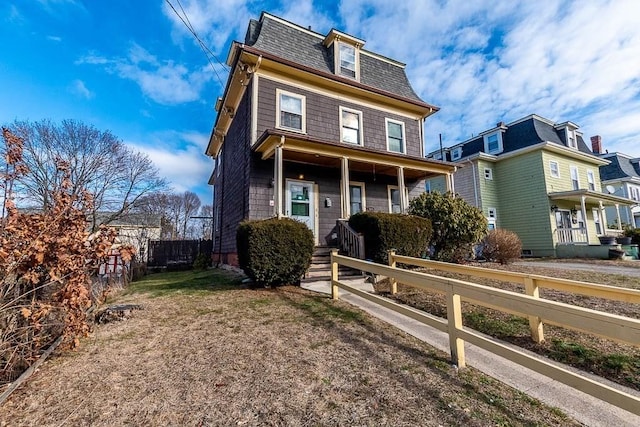 view of front of property featuring covered porch