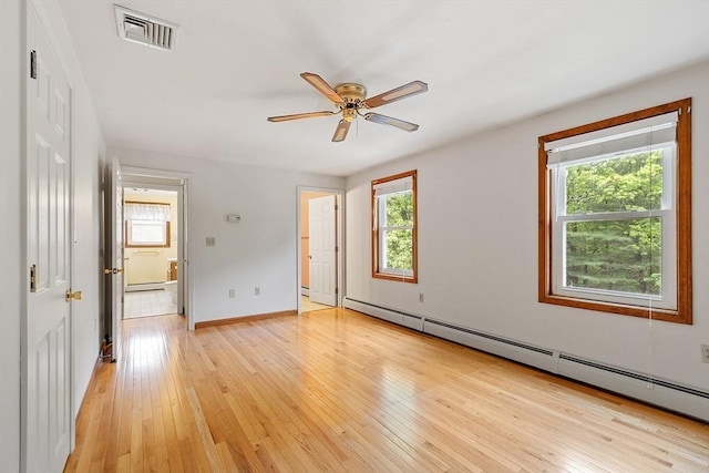 71 Johnny Appleseed Ln, Leominster, MA 01453 - unfurnished room with healthy amount of natural light, a ceiling fan, and light wood finished floors