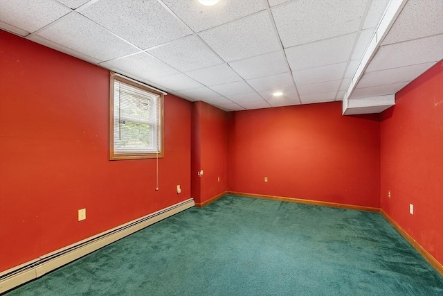 71 Johnny Appleseed Ln, Leominster, MA 01453 - below grade area with baseboard heating, carpet, a paneled ceiling, and baseboards